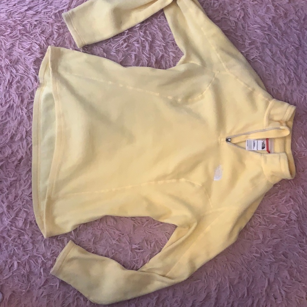 Small yellow North Face fleece pull over